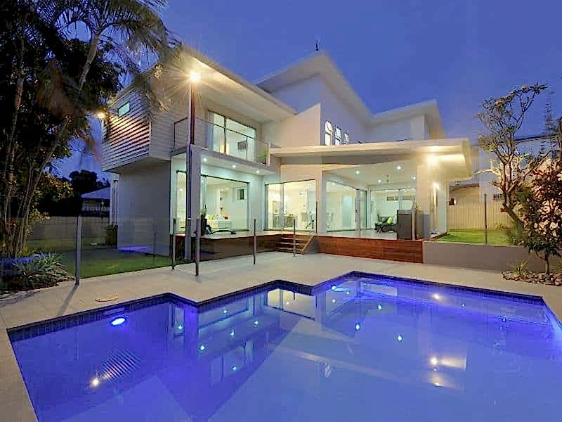 White Villa with spacious pool made by Wahoo Pool builders